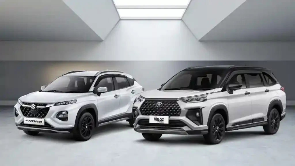 veloz hybrid vs fronx hybrid.webp